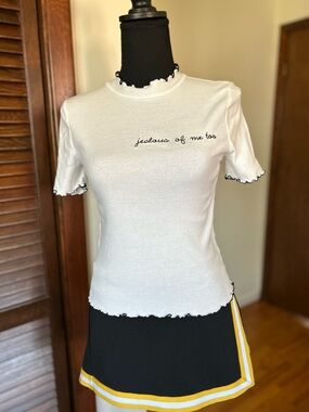 Forever 21 White Tee with Black Ruffle Trim and Script